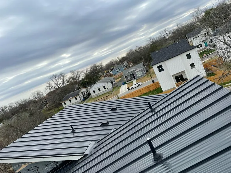 Standing seam metal roof panels with vents for Skylight Repair in Chain Lake